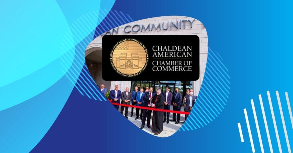 Chaldean Community Foundation staff and community leaders gather for a ribbon-cutting ceremony outside the foundation’s building, with the Chaldean American Chamber of Commerce logo centered above.